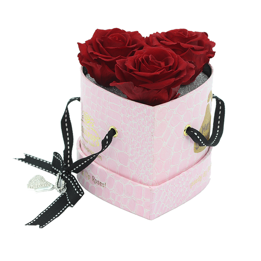 Three Preserved Roses in a Heart Shaped Box - with a hershey kiss charm